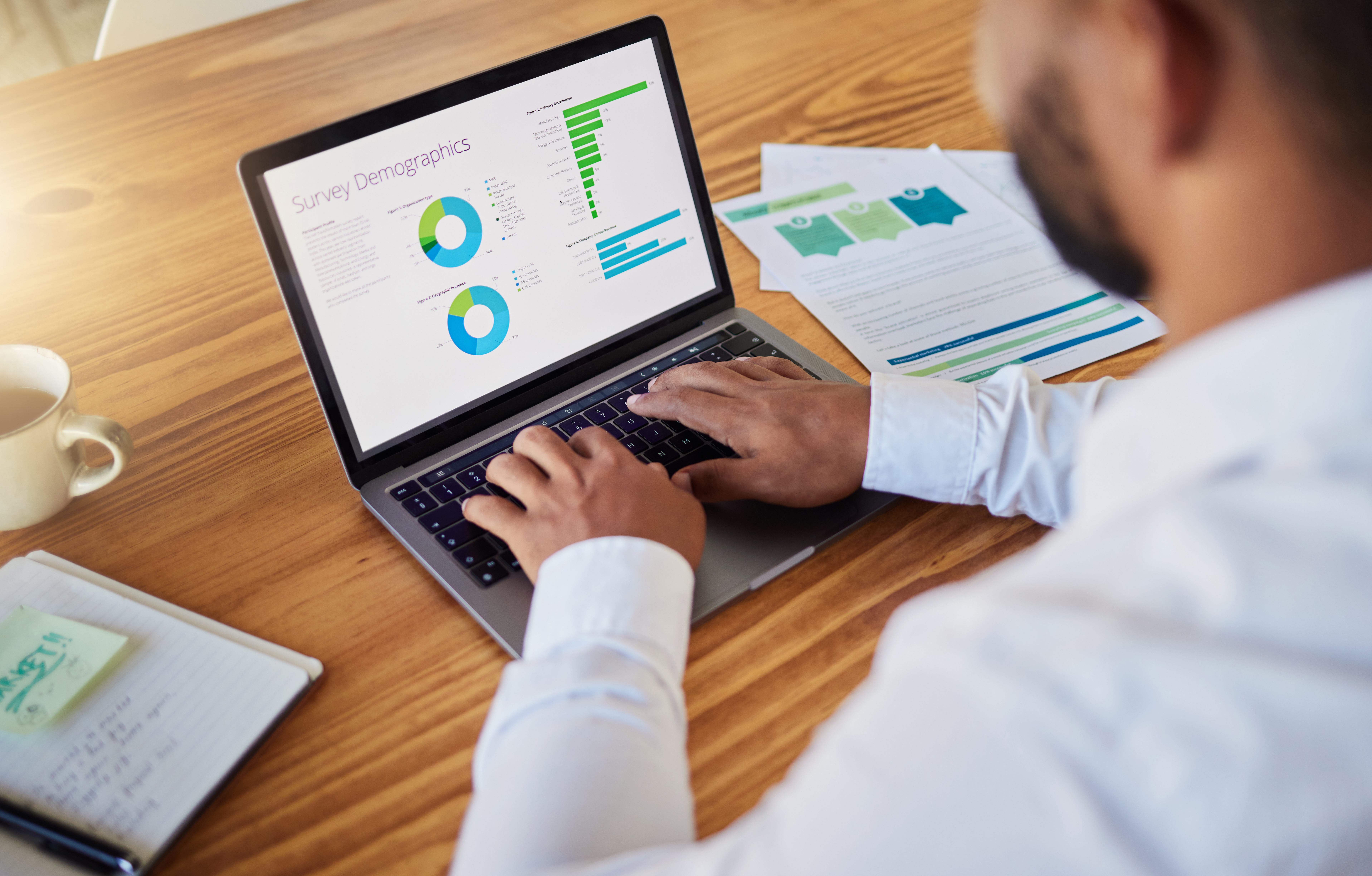 business-man-planning-with-finance-graph-on-laptop-2023-11-27-05-01-19-utc